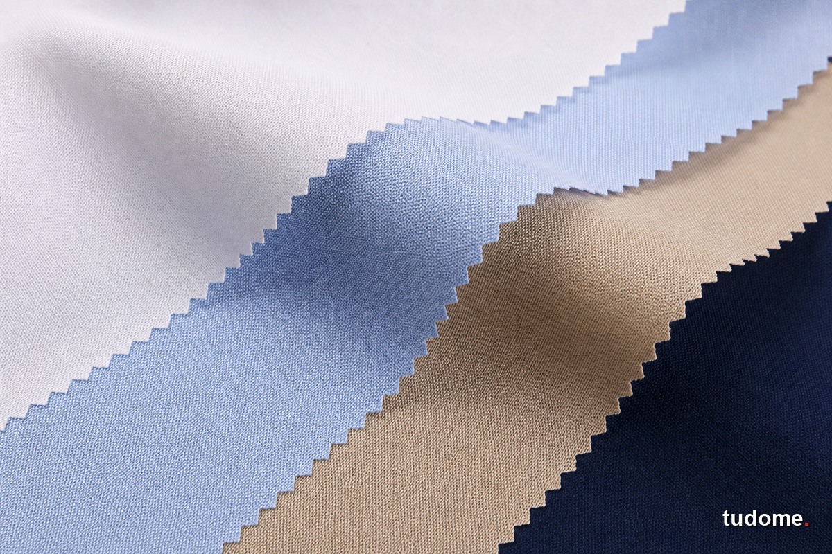 Các mẫu vải poplin trắng, xanh nhạt, be và navy có bề mặt mịn