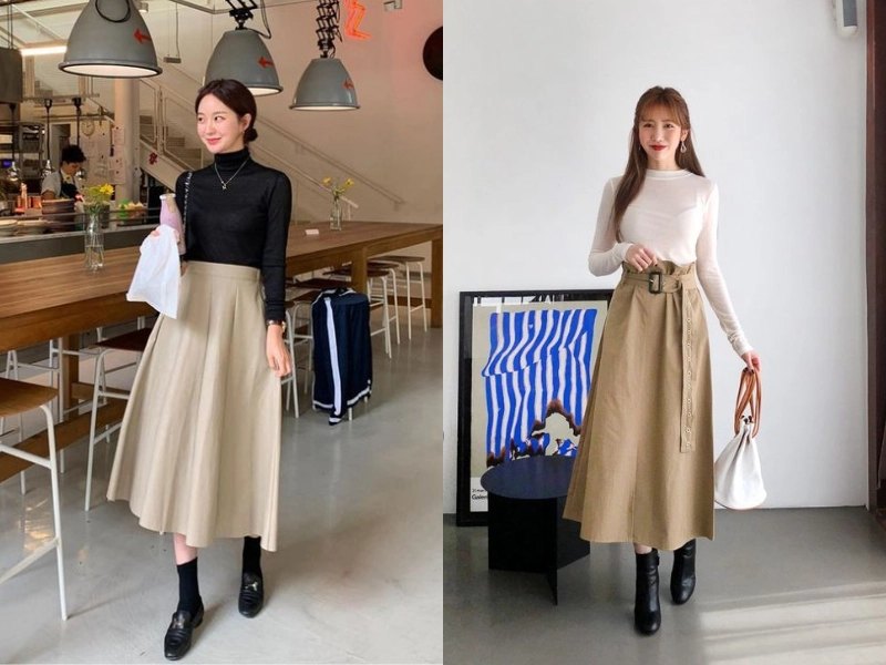 Chân váy xếp ly kết hợp áo len và boots tạo outfit mùa đông ấm áp